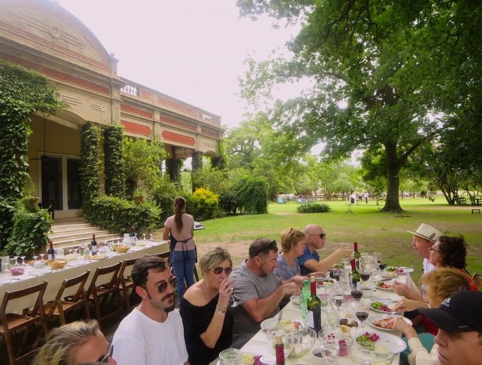 A group of people sitting at a table Description automatically generated