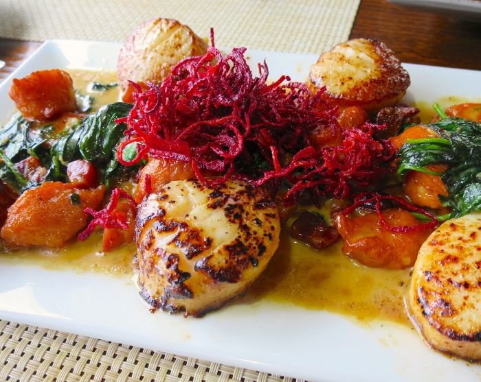 A plate of food on a table Description automatically generated