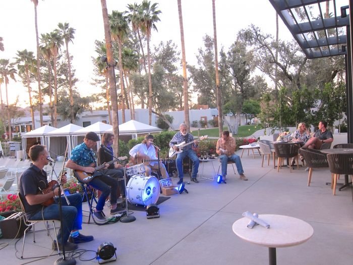 A group of people sitting in a chair

Description automatically generated