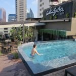A person in a pool Description automatically generated