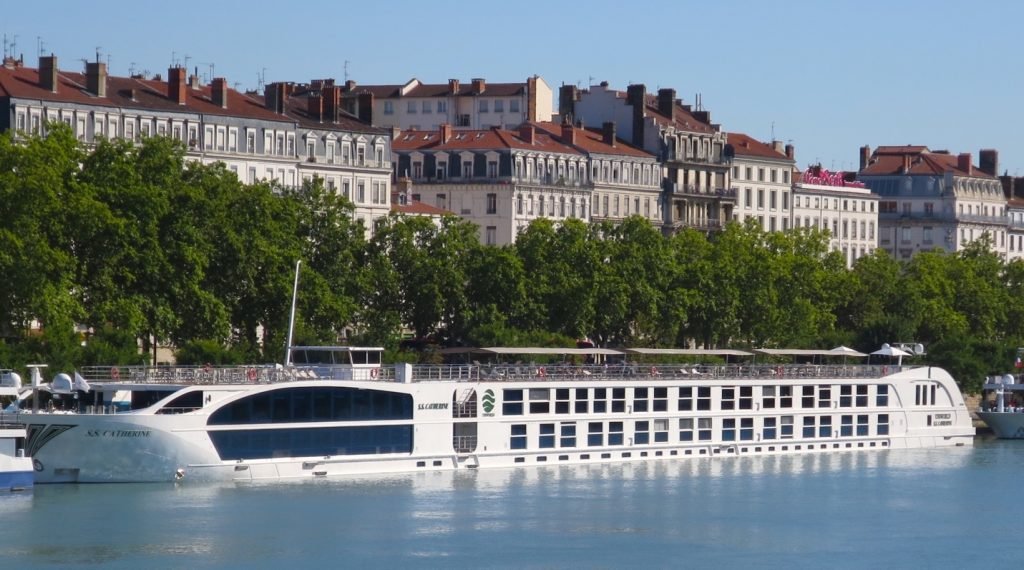 A large boat in a body of water Description automatically generated