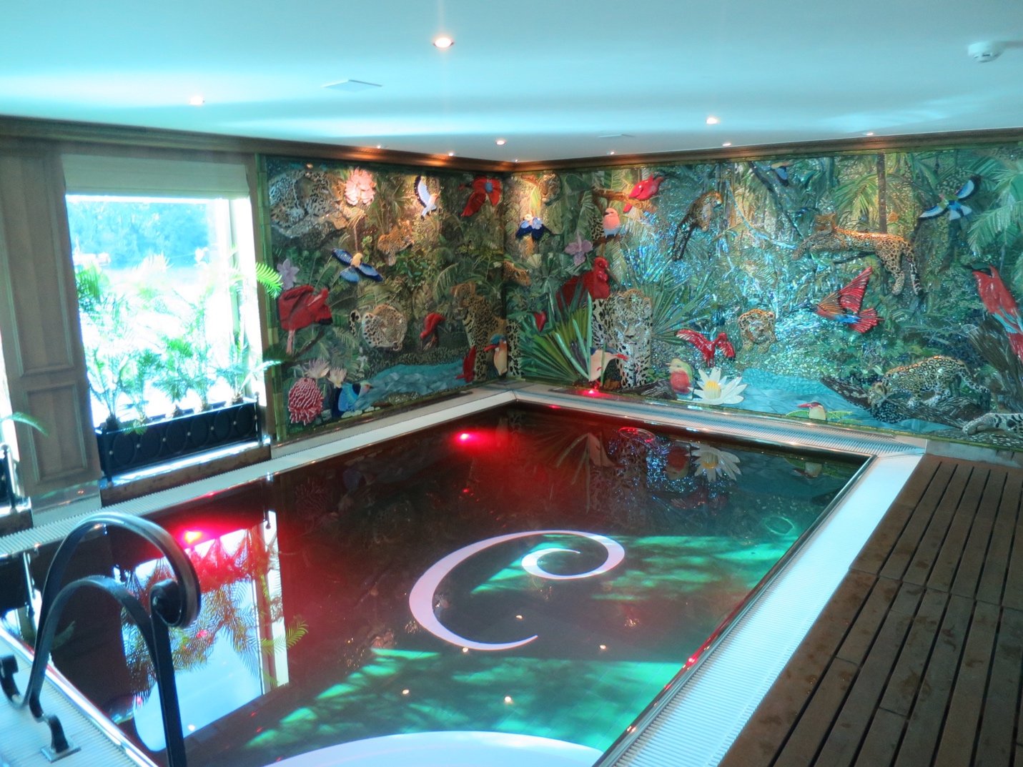 A picture containing indoor, sitting, table, standing Description automatically generated